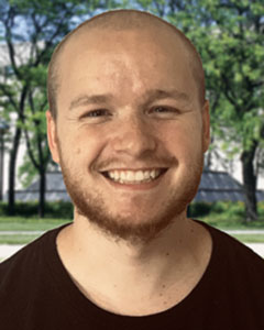 Image of study co-author Kevin Feller standing in front of Wood Fountain at IUPUI